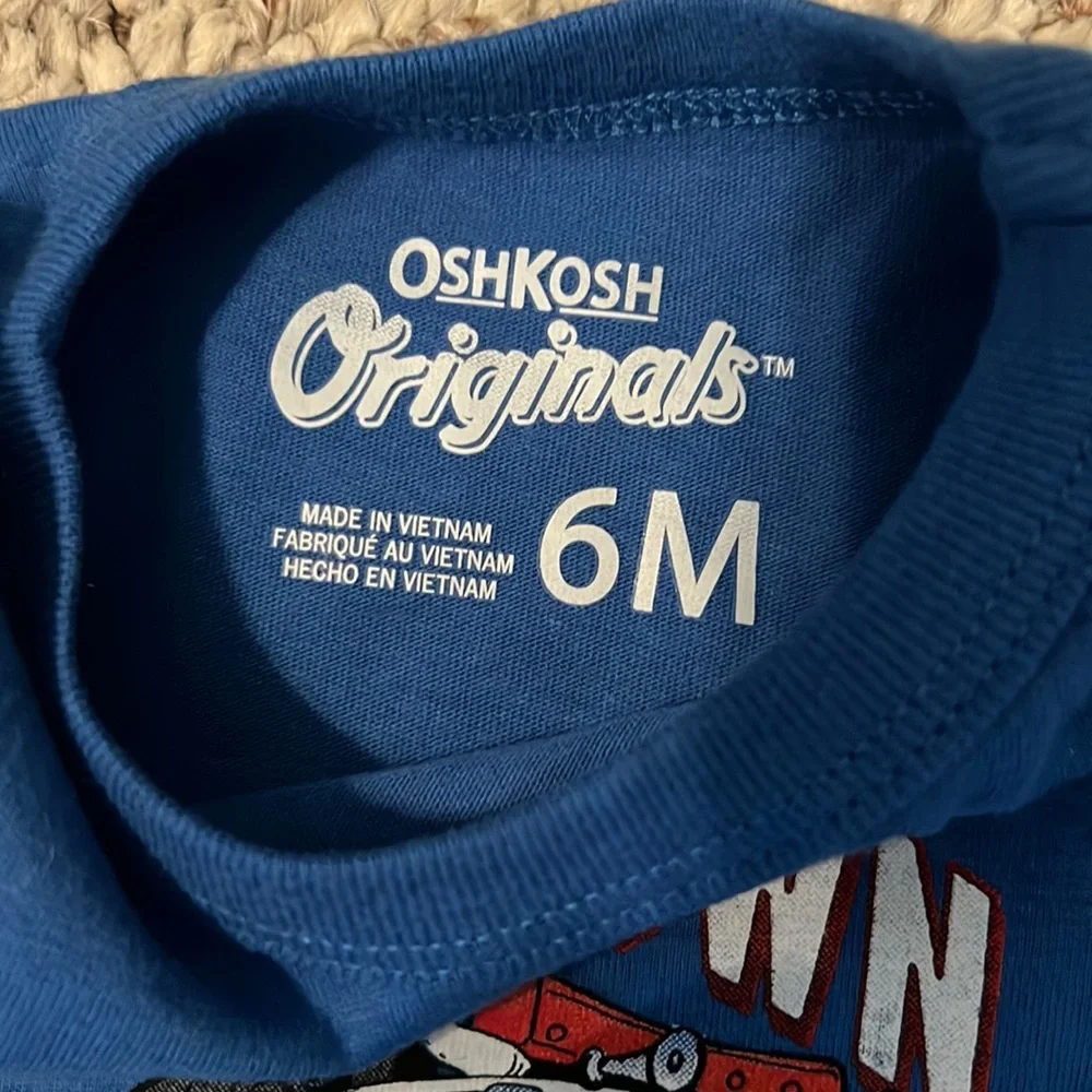 Oshkosh B’gosh boys onesie.